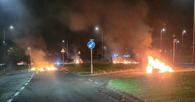 Dundee riots sees youths set road on fire and toss fireworks into blaze as emergency services race to scene