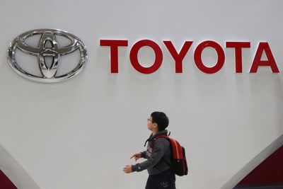 Toyota reports quarterly profit decline amid chips crunch