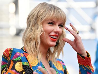 Taylor Swift becomes the first artist in history to have 10 singles in the Billboard Top 10