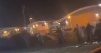 Shocking footage from Dundee riots show feral youths set city ablaze as shielded cops descend on scene