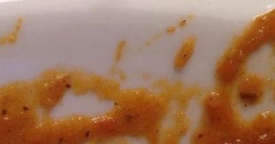 Man gobsmacked to find Jesus' face in chicken curry - but others see famous rockstar