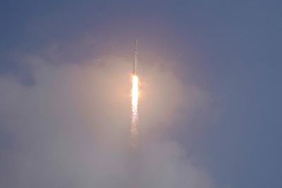 SpaceX nails booster landings after foggy military launch