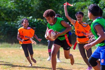 World Cup fans help vulnerable girls play rugby