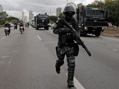 Day of violence feared in Brazil as Bolsonaro supporters block roads over Lula victory