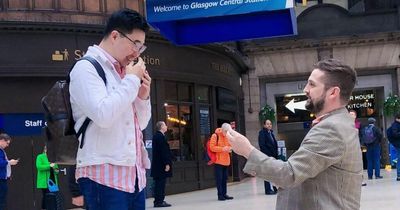 Glasgow couple get engaged under Central Station clock where they first met