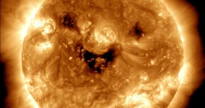 NASA shares rare picture of the sun 'smiling' - leaving some people terrified