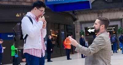 Man proposes to partner under clock at Glasgow Central station where couple first met