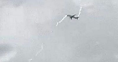 Dramatic image captures moment Airbus Beluga XL5 is struck by lightning over north Wales