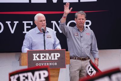 Pence backs GOP's Kemp as Democrat Abrams hits on Medicaid