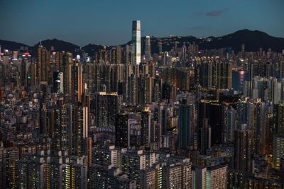 'Law and order returned' Hong Kong's US-sanctioned leader says at banking summit