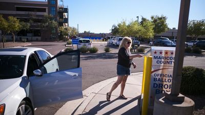 Judge curbs Arizona monitoring group's ballot box actions after voter intimidation reports