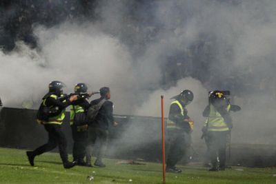 Indonesia human rights body blames use of tear gas for football stampede