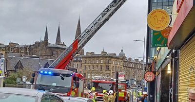 Two hurt in Edinburgh shop fire as crews battle blaze in busy street