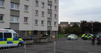 Two men found dead at Edinburgh tower block as police lock down homes