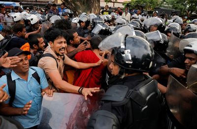 Hundreds march in crisis-hit Sri Lanka protesting tax hikes, crackdowns