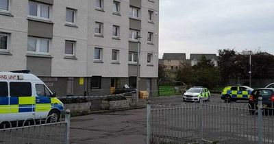 Two men found dead at Scots high-rise flat as cops tape off scene