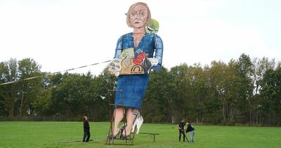 Giant Liz Truss effigy with laughing lettuce on her shoulder to burn at bonfire event