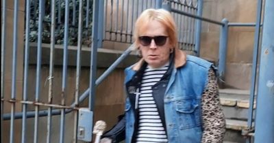 Woman who hurled pizza and skateboard makes history by appearing in court as male and female