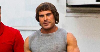 Zac Efron looks unrecognisable with pudding bowl haircut and bulging biceps