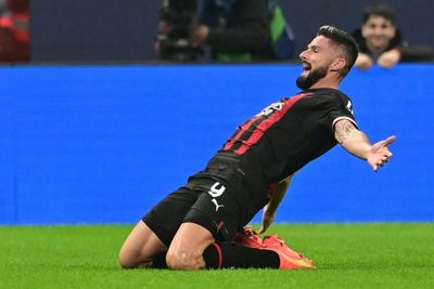Giroud fires AC Milan past Salzburg and into Champions League knockouts
