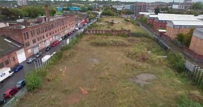 Drone footage shows massive stalled site on edge of the city