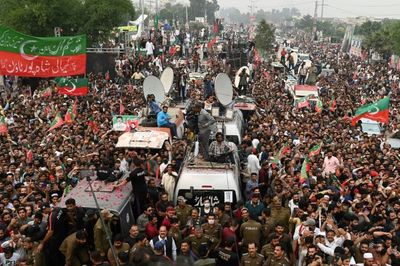 Chaotic and cultish: Khan's carnival edges towards Islamabad