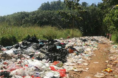 Villagers call for help as dumped tourist garbage blocks road