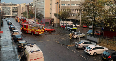 Edinburgh woman rescued by hero crews from a balcony fire at the Banana Flats