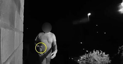 Neighbour filmed 'pouring urine through letterbox' over parking war