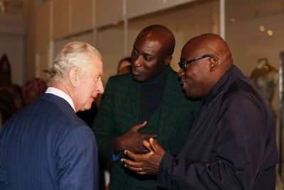 King visits exhibition of African fashion in ‘symbolic’ visit