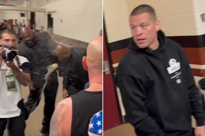 Alternate video shows Nate Diaz and Jake Paul entourages scuffle up close, bodyguard pelted with beer