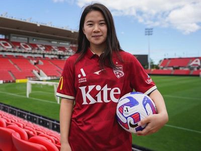 ALW Reds sign China's Cup hero Xiao Yuyi