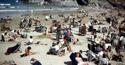 'Time traveller' spotted 'scrolling on phone' in beach photo from the 1940s