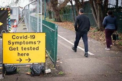 Covid infections fall in England and Wales in sign autumn wave may have peaked