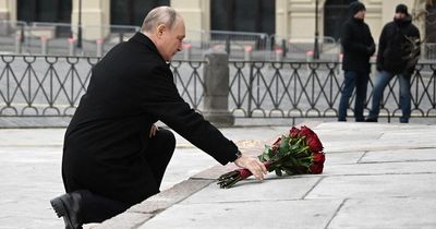 Vladimir Putin moves awkwardly in Red Square as rivals quip 'old age is not a joy'