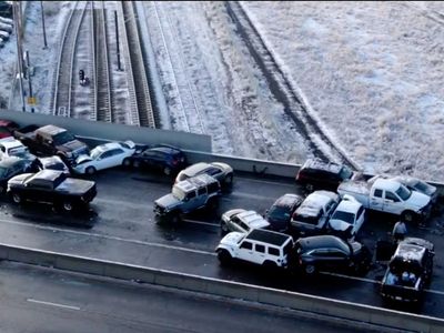 Dramatic drone footage captures 100-car pile-up on icy Denver roadway