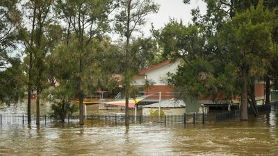 NSW residents evacuate with over 100 rescues in a single day in flooded country town