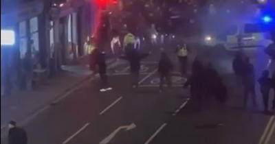 Football fans clash in Aberdeen as footage shows crowds gathered on busy street