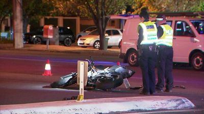 Motorbike rider killed in crash with streetlight pole at Adelaide intersection