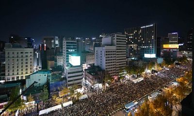 Itaewon crowd crush: thousands join vigil as anger grows in South Korea