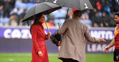 Kate Middleton braves rain to cheer on England in Rugby League World Cup quarter-final
