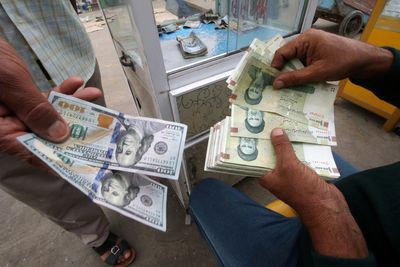 Iran’s embattled currency plunges to historic lows amid protests