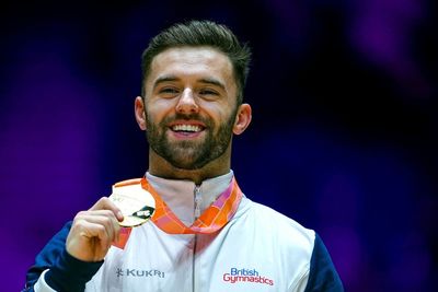 ‘I’m lost for words’: GB’s Giarnni Regini-Moran wins historic world floor gold