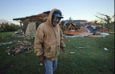 Two dead and dozens injured after twisters rip through three US states