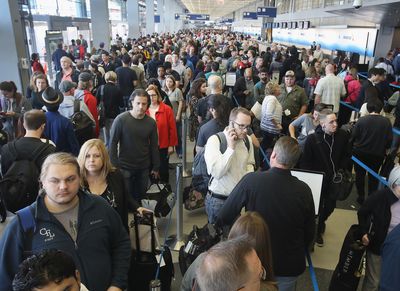 Ahead of the holidays, the cost for TSA PreCheck is dropping