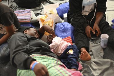 Nearly 1,000 migrants stranded on board NGO ships as storm hits