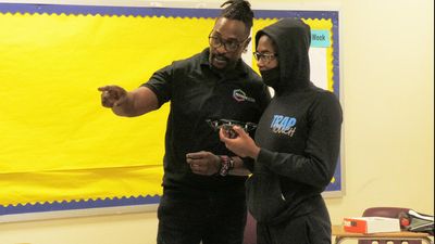US midterms J-3: 100 black men are combatting racism in an Atlanta school