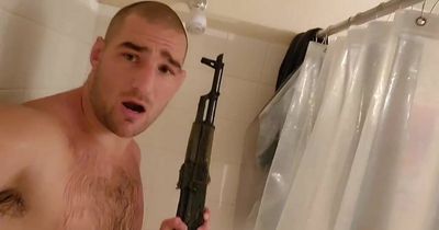 UFC star shares "schizophrenic" video of himself showering with rifle