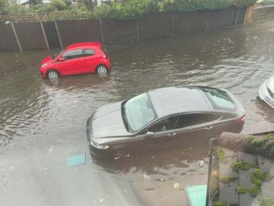 London suffers flooding as Met Office issues weather warning