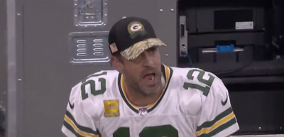 Cameras captured Aaron Rodgers’ furious sideline reaction to his interception in the end zone